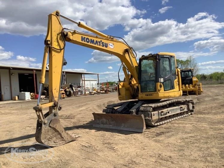 Used Komatsu Excavator under the blue sky